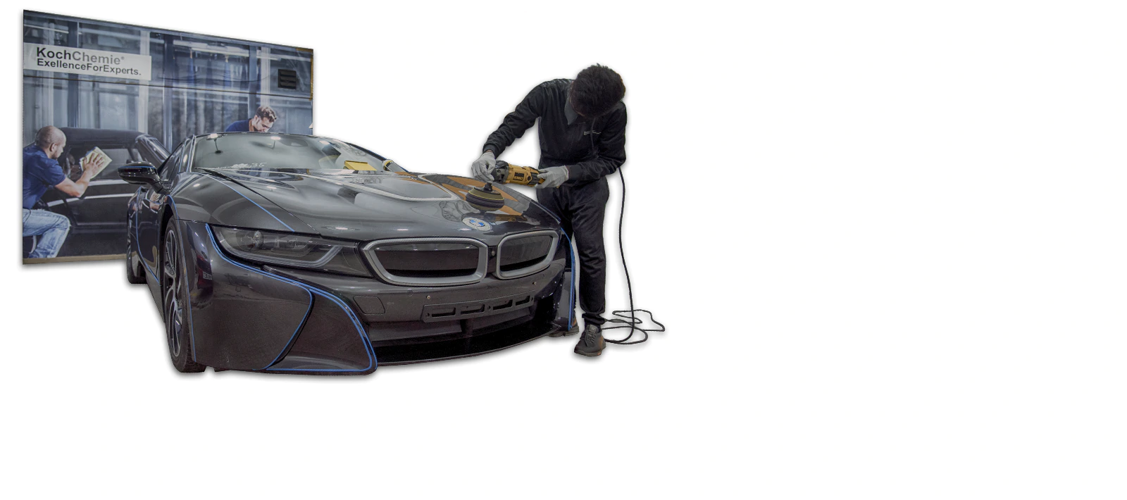 a professional car detailer is polishing the paint surface of bmw i8